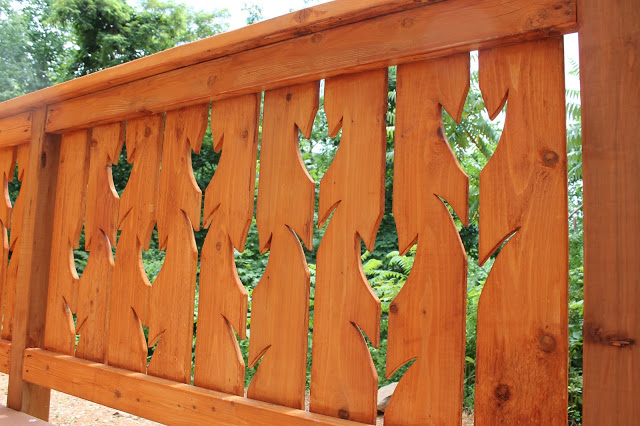 wooden railing with tulip shapes