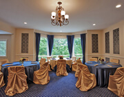 meeting room with gold and blue tones and furniture
